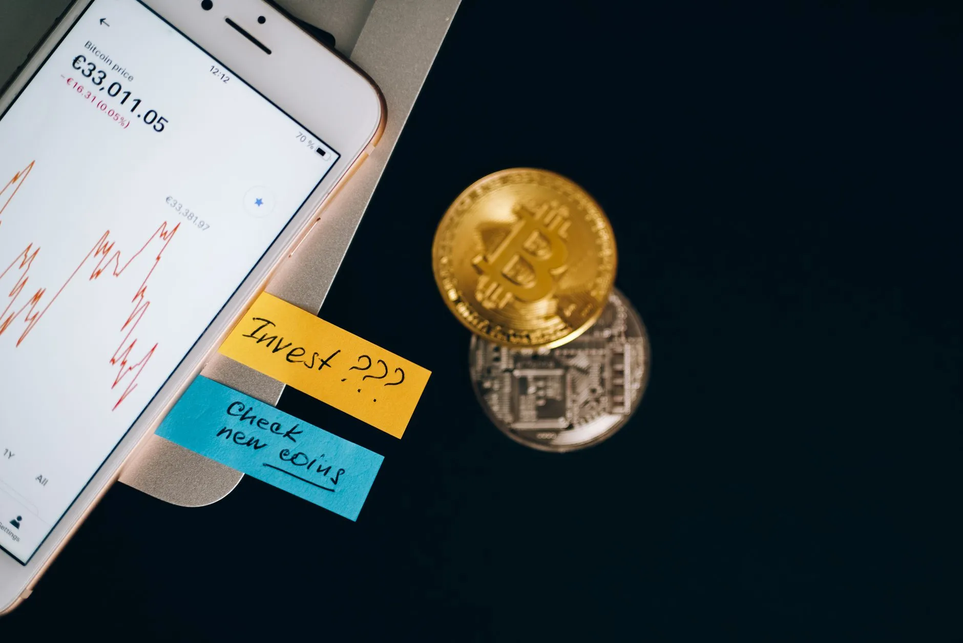 Gold coins and a financial chart, representing record bitcoin ETF flows.